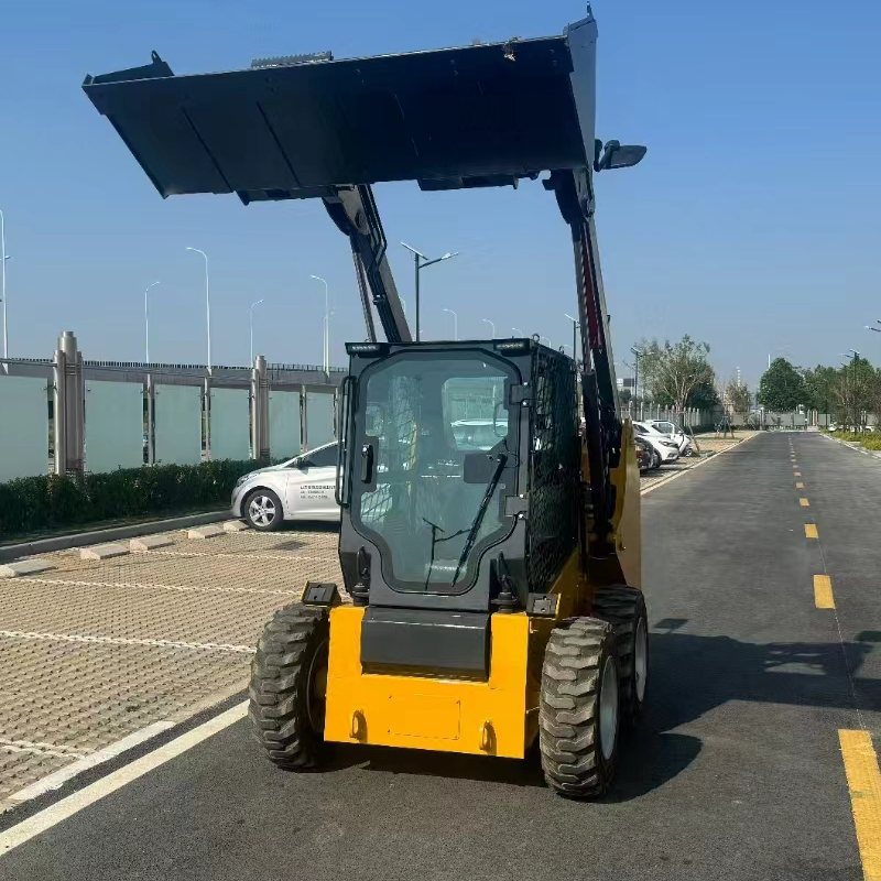 Wheeled skid steer loader working on site
